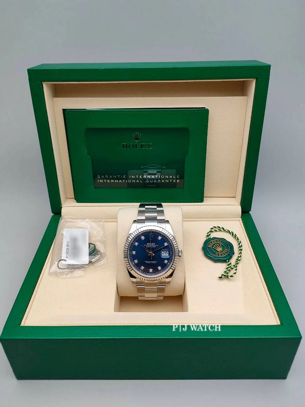 Rolex Datejust 41mm Oystersteel Blue Diamond Dial White Gold Bezel Ref.126334