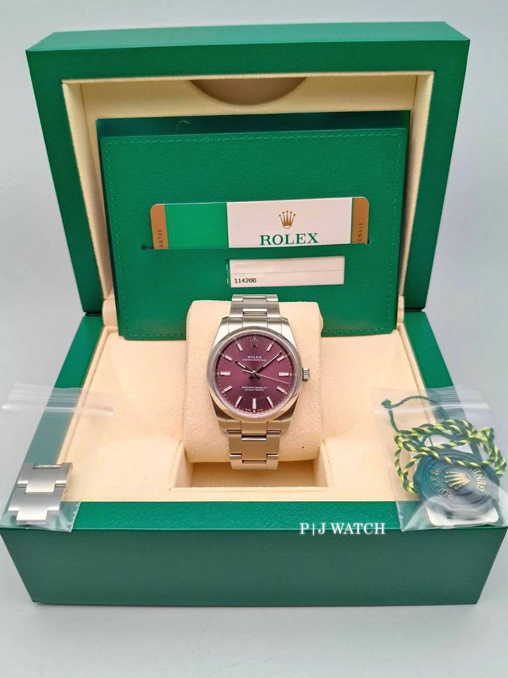 Rolex Oyster Perpetual 34mm Red Grape Dial Steel Oyster Ref.114200